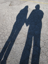 Casey Friedman, Minna Biggs, shadows holding hands